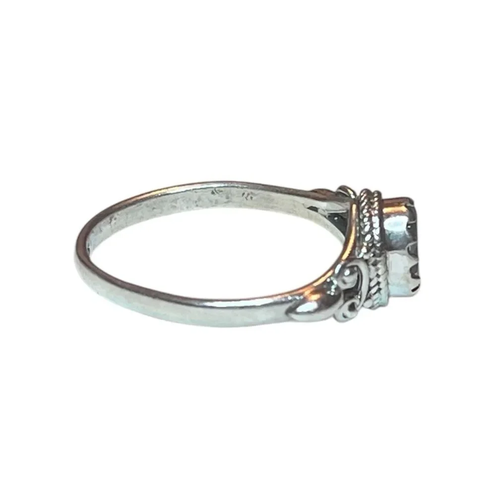 Elegant Sterling Silver and Blue Topaz Gemstone Ring Size 10